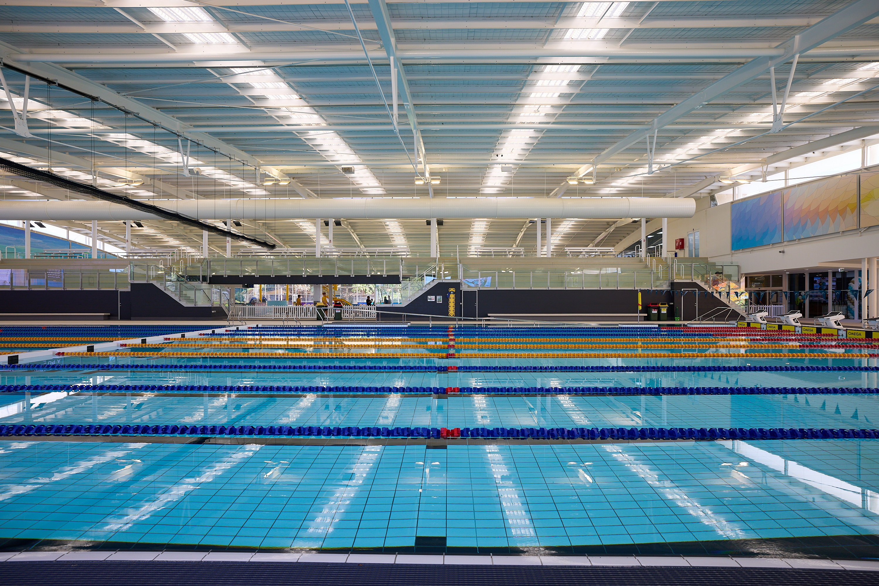 Grandstand seating overlooking 50m pool
