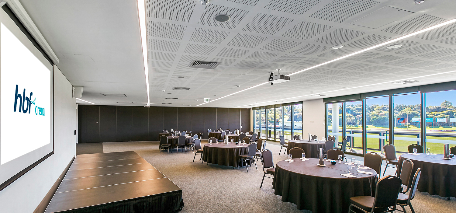A function room set up with tables and chairs