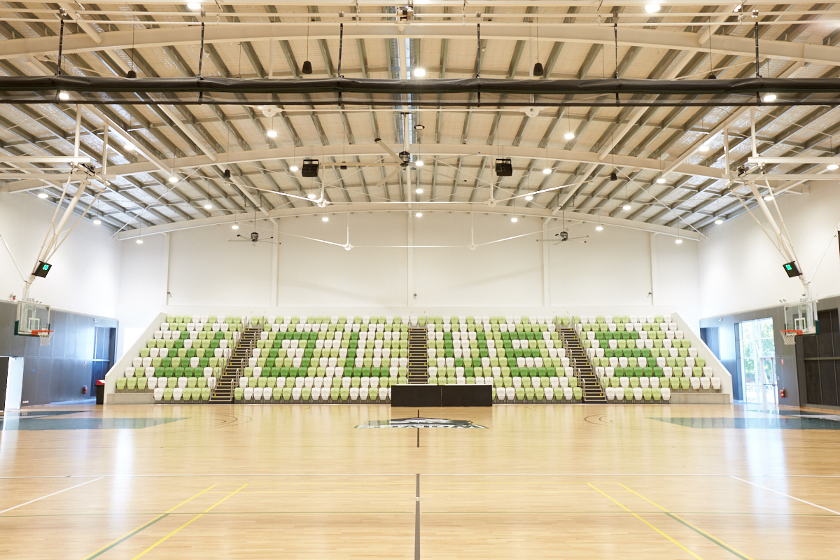 A photo of an indoor grandstand where certain seats spell out "Wolves"